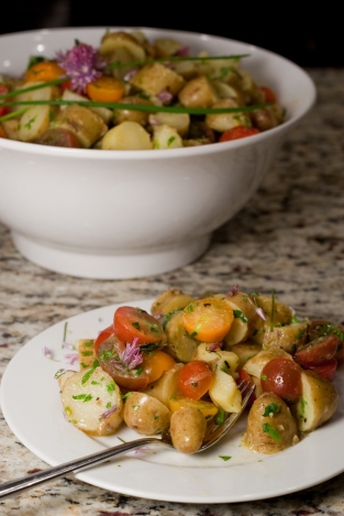 Serve light-tasting French potato salad with this white wine, herb-poached chicken.
